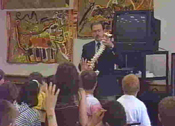 Dr Kenney lecturing to school children